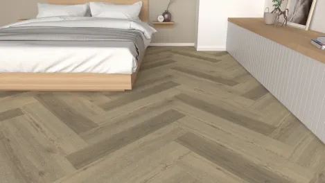 Raumbild Schlafzimmer – Perugia Eiche Fischgrät Vinylboden für entspannten Schlafbereich